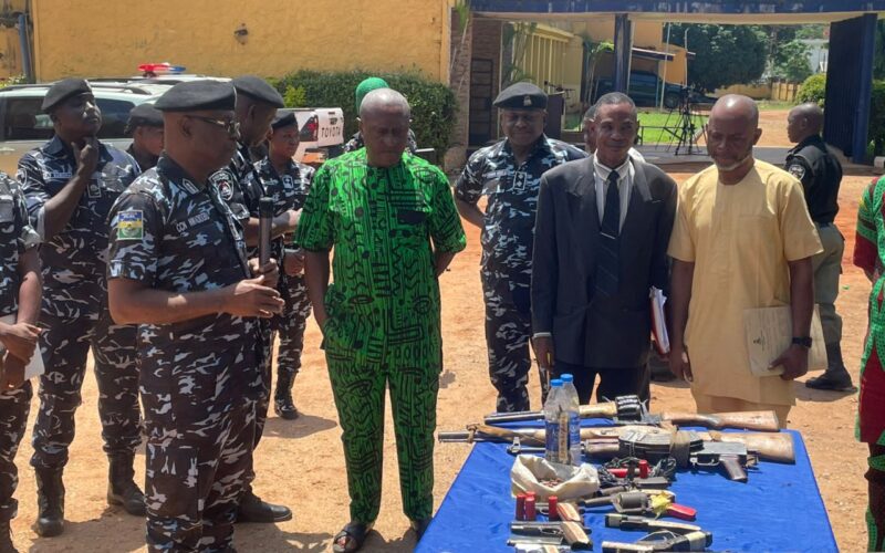 Benue State Police Commissioner Cletus Nwadiogbu displays recovered arms and exhibits at the Makurdi press briefing. Photo: Vanguard.