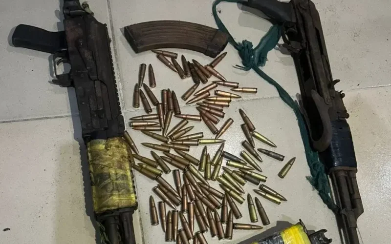 Recovered rifles and ammunition from suspected arms shipment