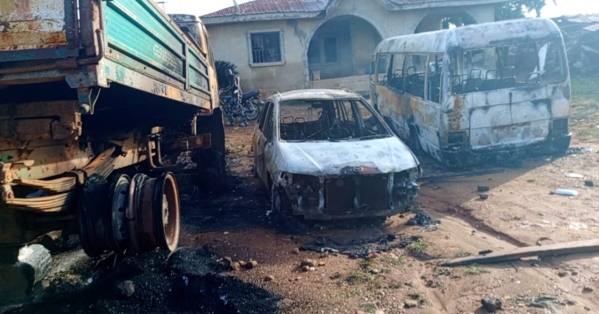 Burnt vehicles at the scene of the Isan-Ekiti police station attack, June 20, 2026