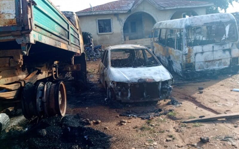 Burnt vehicles at the scene of the Isan-Ekiti police station attack, June 20, 2026