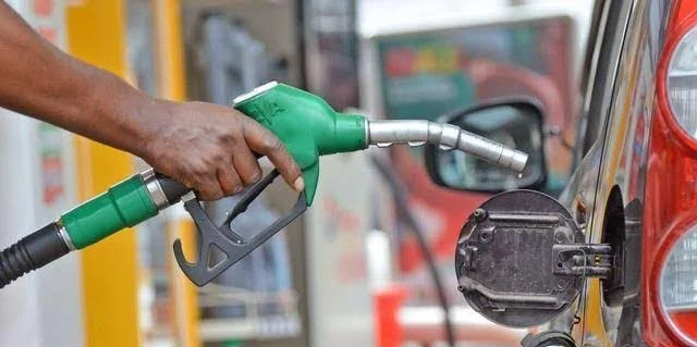 Fuel pump nozzles at a Nigerian petrol station
