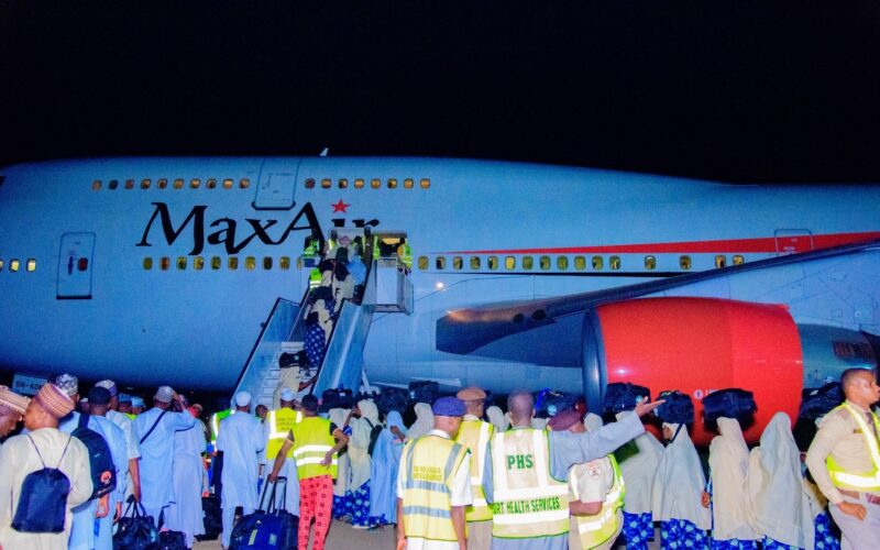Hajj pilgrims boarding a Max Air aircraft at night. Photo: Premium Times/Katsina State Government