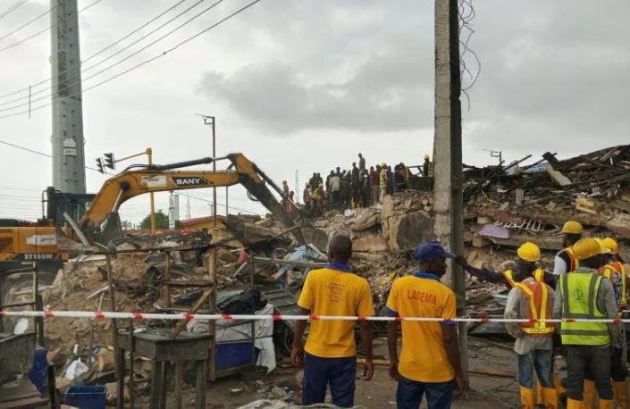 Rescue workers at the collapsed building site near Alakija Bus Stop in Lagos
