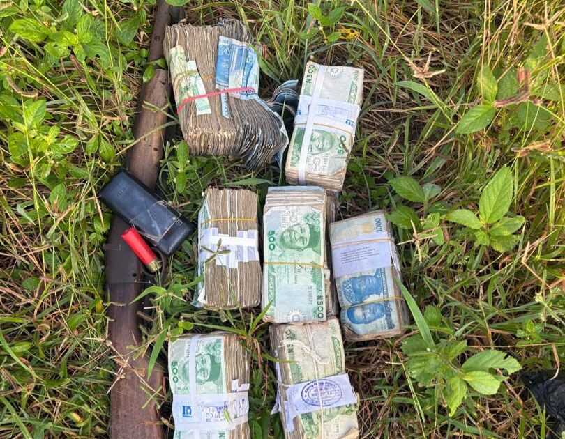 Cash and a gun recovered by Ogun police after a kidnapping operation