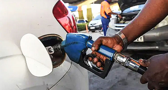 Fuel pump nozzle at petrol station