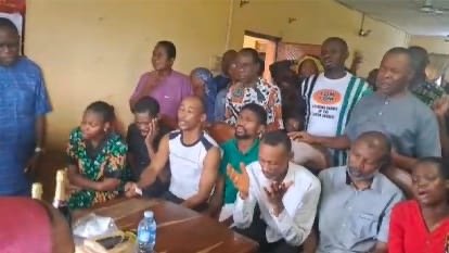 People gathered after the release of abducted Scripture Union delegates
