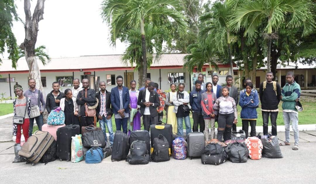 Arrested foreign nationals with luggage after a Nigerian Army raid in Lagos