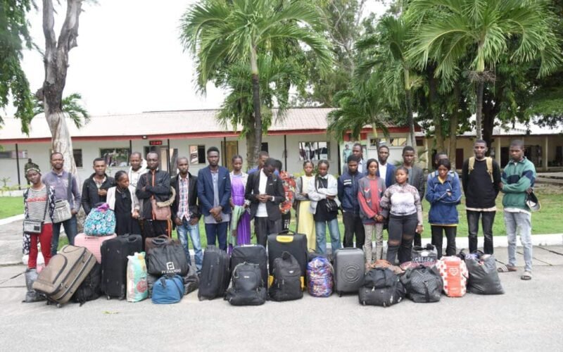 Arrested foreign nationals with luggage after a Nigerian Army raid in Lagos