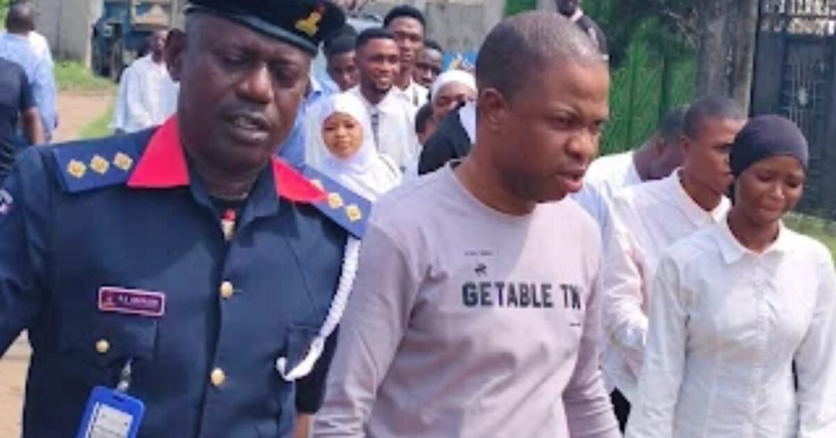 NSCDC officer with rescued youths in Lagos