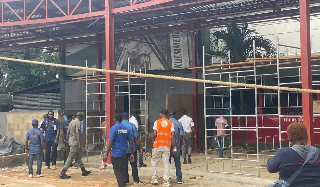 Officials at a property sealed during Lagos planning enforcement in Ikeja