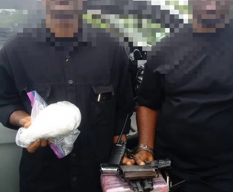Two suspects and recovered items shown by Delta police