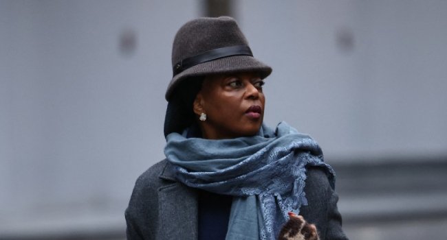 Diezani Alison-Madueke in a coat and hat