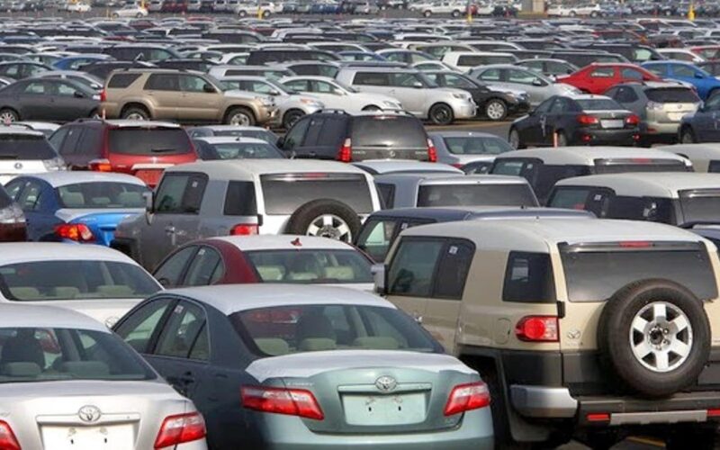 Imported vehicles parked in a large car lot