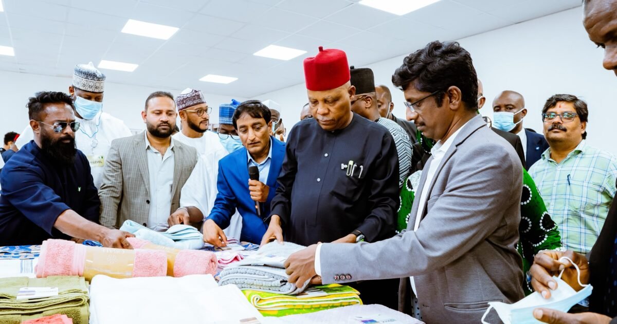 Vice President Kashim Shettima and Nigerian officials inspect textile products at Benin’s Glo-Djigbé Industrial Zone