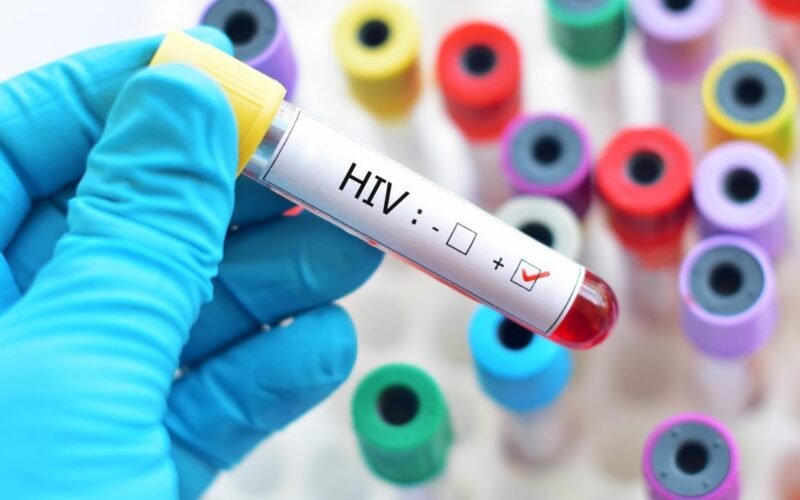 Illustrative HIV blood-test image for a report about the AIDS 2026 conference
