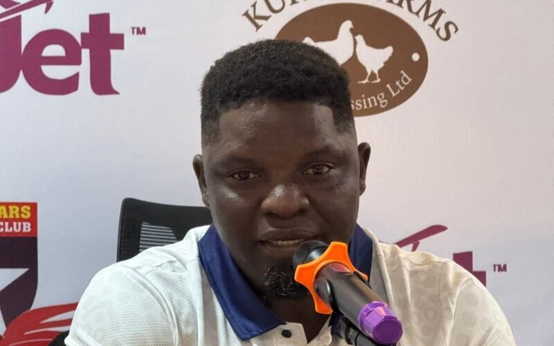 Daniel Ogunmodede speaks into a microphone. Photo: Premium Times