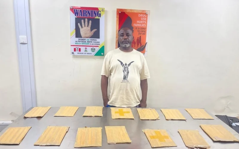 NDLEA cocaine arrest suspect with recovered packages in Lagos