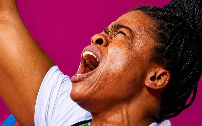 Esther Nworgu celebrates during a para powerlifting event