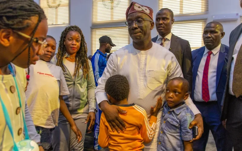 Source-origin photo from Punch showing Governor Monday Okpebholo with Edo returnees at Government House.