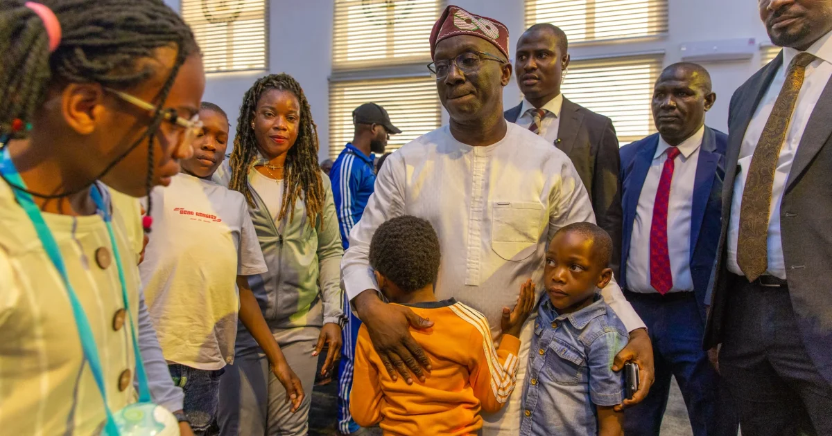 Source-origin photo from Punch showing Governor Monday Okpebholo with Edo returnees at Government House.