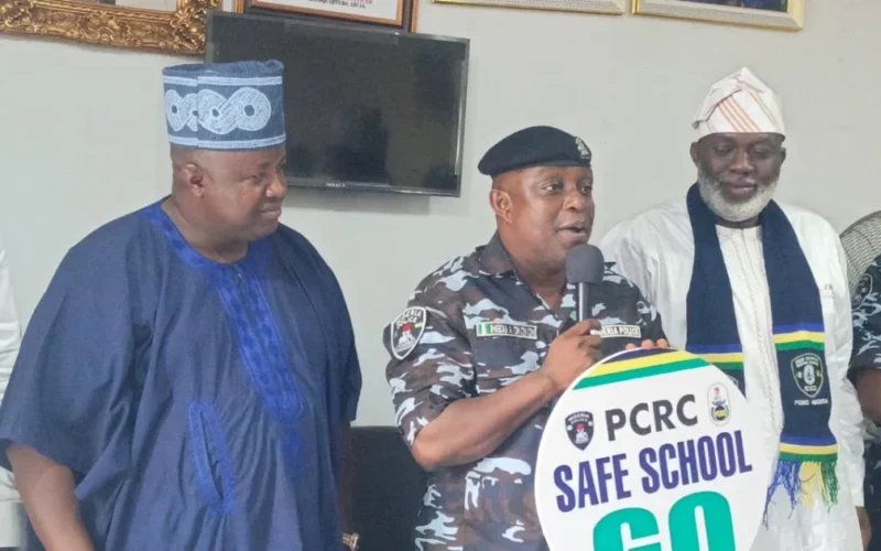 PCRC leadership and police spokesperson at Safe Schools Initiative visit