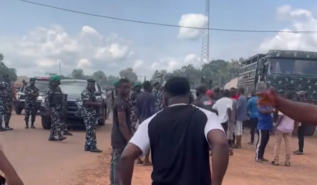 Security personnel and residents at a Benue Otukpo attack scene