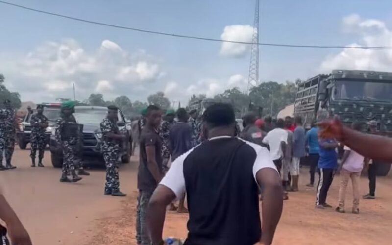 Security personnel and residents at a Benue Otukpo attack scene