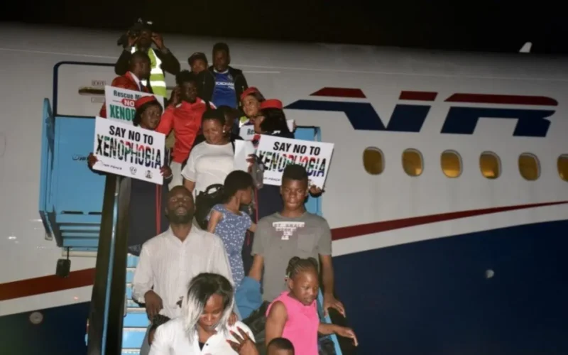 Nigerian returnees disembarking from an Air Peace aircraft after evacuation from South Africa