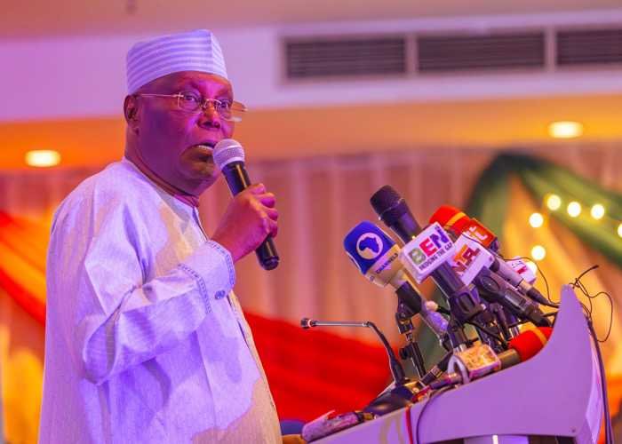 Atiku Abubakar speaking at a podium