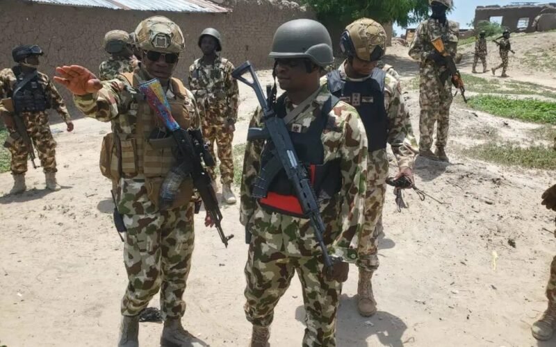 Illustrative photograph of Nigerian troops during security operations in Borno; not the wanted ISWAP commanders or the reported device recovery scene