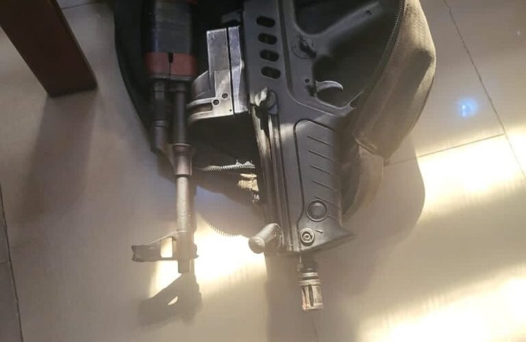 Source-origin photo of a rifle and ammunition linked to the Imo monarch murder police operation