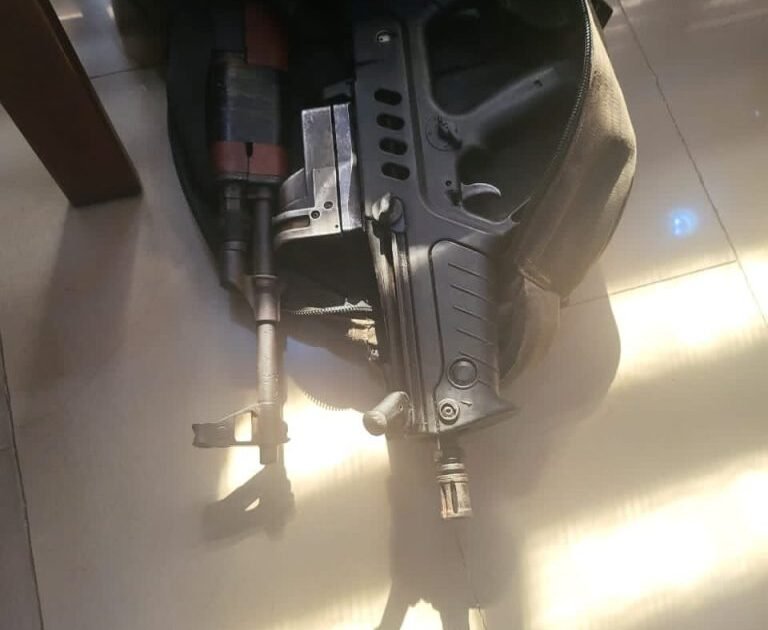 Source-origin photo of a rifle and ammunition linked to the Imo monarch murder police operation