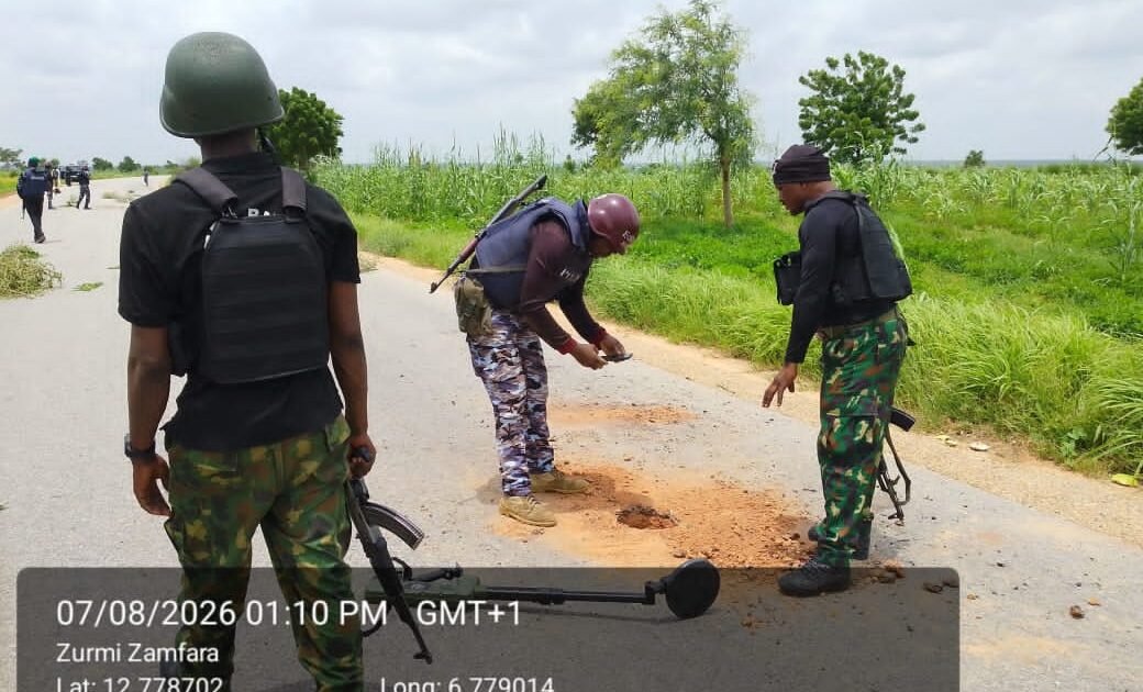 Security personnel inspect a road in Zurmi, Zamfara, after an IED alert
