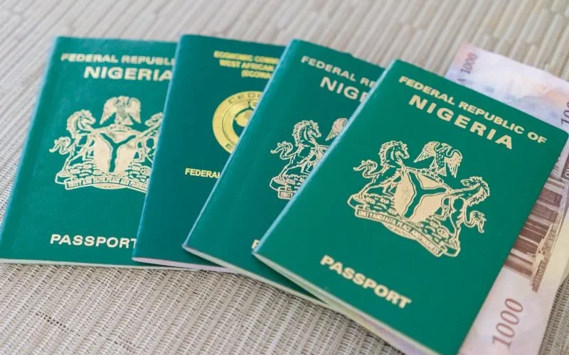 Nigerian passports arranged on a surface, used as an illustrative image for the UK passport intervention exercise.