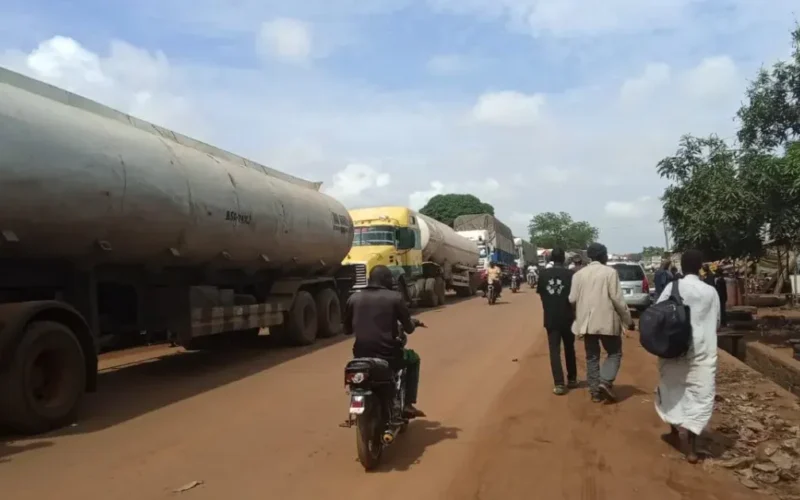Illustrative heavy trucks and travellers on the Mokwa-Bida Road in Niger State. This photograph was not taken at the Wuya crash.