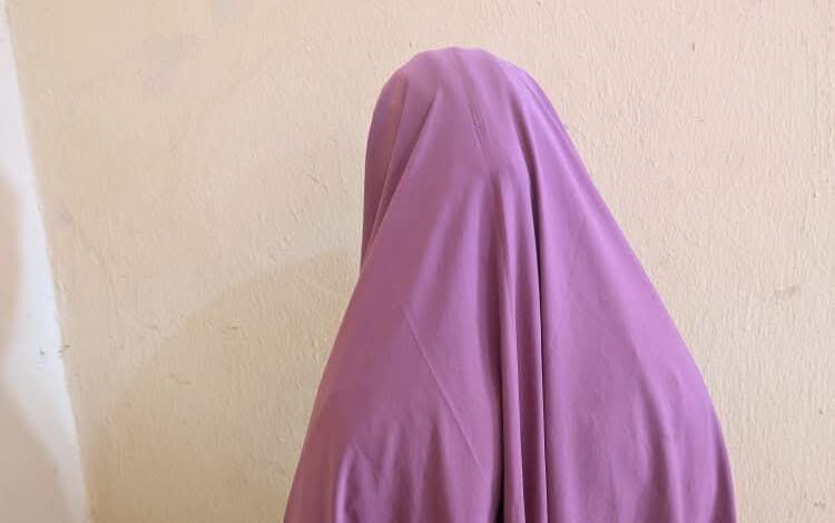 A covered woman photographed in connection with the Kebbi newborn theft allegation