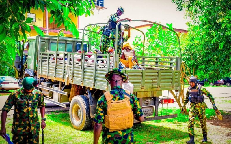 Soldiers with suspected illegal miners in Niger State