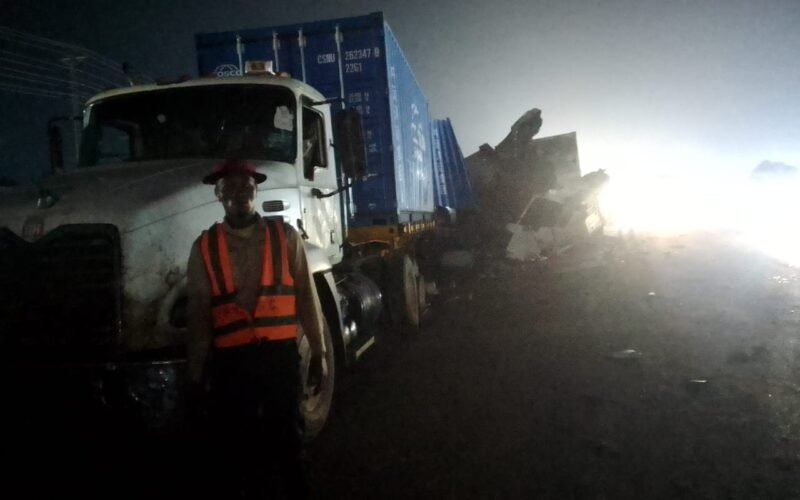 Truck and damaged vehicle at the scene of the Ogun multiple road crash