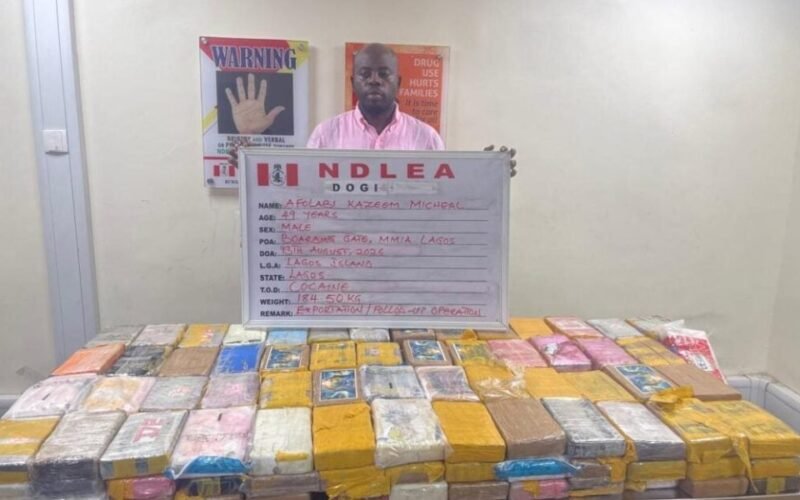 Afolabi Kazeem Micheal, known as KC Luxury, shown in an NDLEA arrest photo with seized packages.