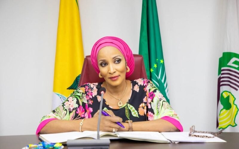 Bianca Odumegwu-Ojukwu seated at a meeting