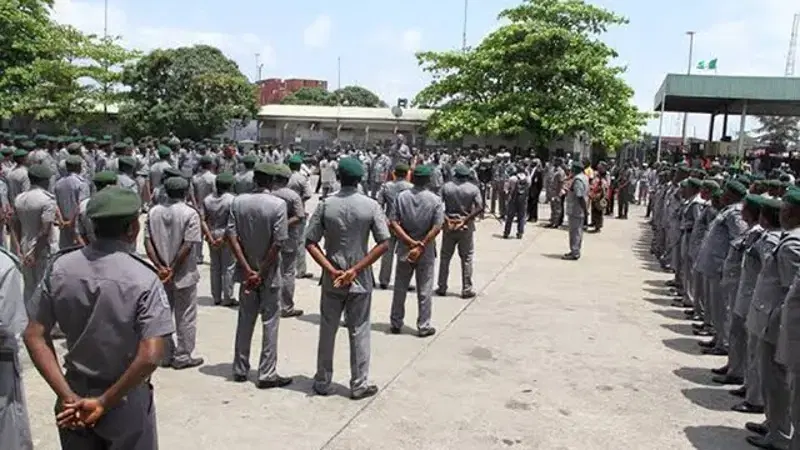 Nigeria Customs Service officers standing in formation at a Customs facility
