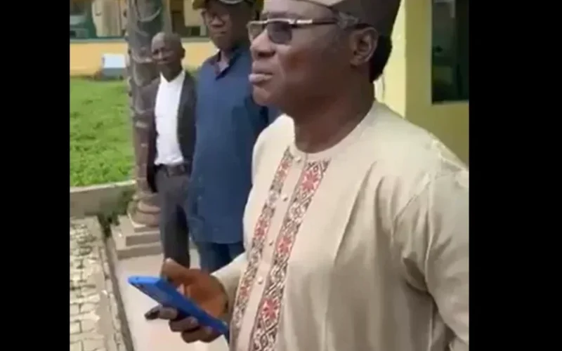 An Atiba University official shown during the law students protest video