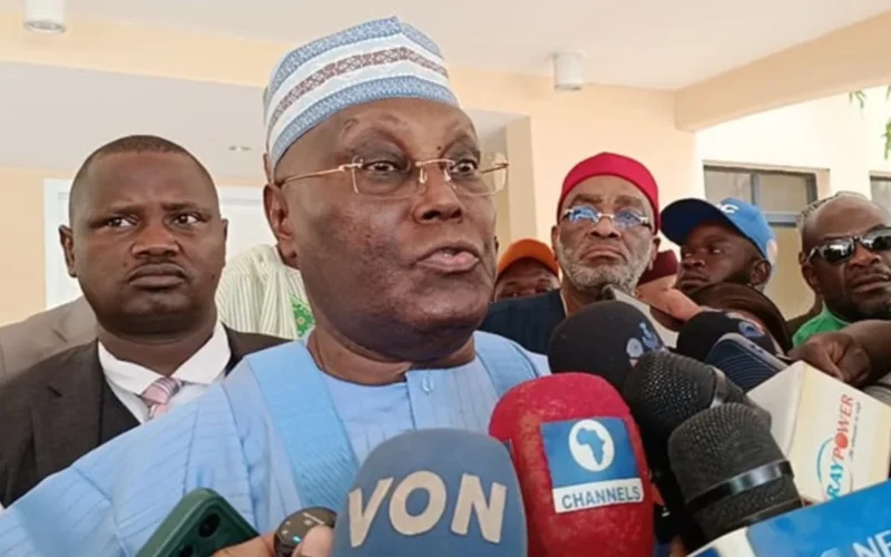 Atiku Abubakar speaking to reporters during a political event