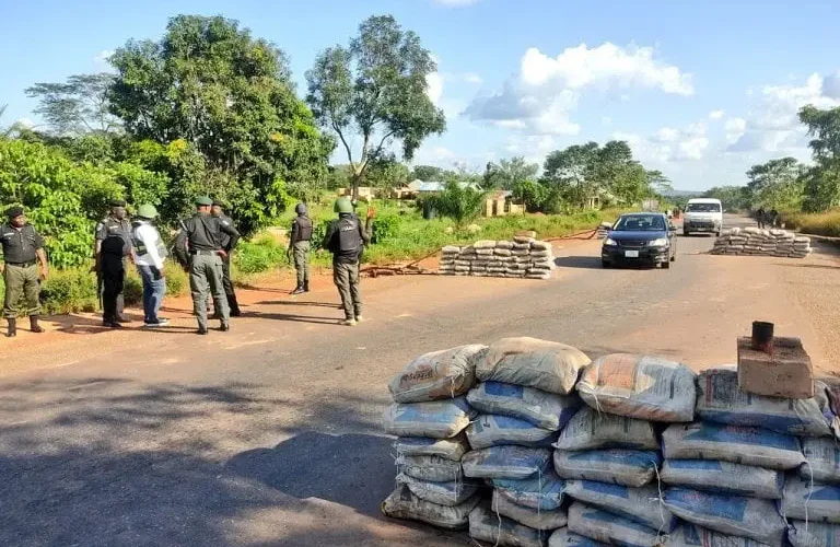 Security personnel at a checkpoint on an Otukpo road in Benue State, used as a contextual image for the passenger rescue report.