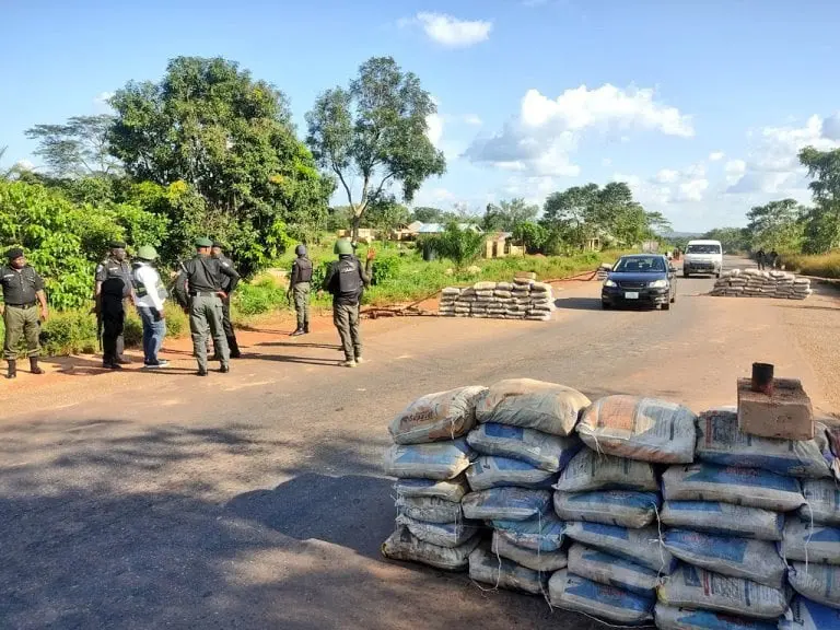 Security personnel at a checkpoint on an Otukpo road in Benue State, used as a contextual image for the passenger rescue report.