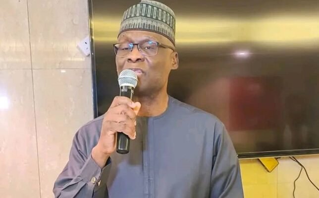 NAHCON official Abba Ismail Yusuf speaking into a microphone.