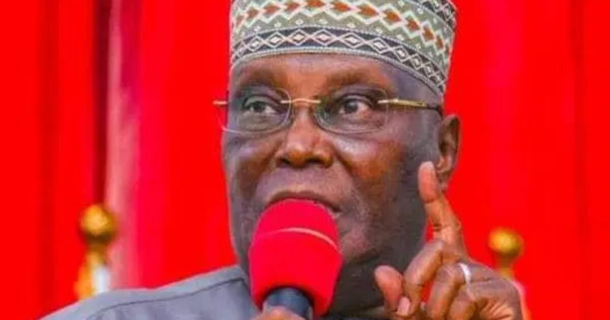 Atiku Abubakar speaking into a microphone at a public event.
