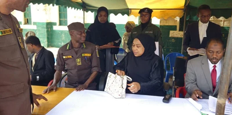 Source-origin Punch photo from the Kano jail delivery exercise, showing correctional and judicial officials at the venue.