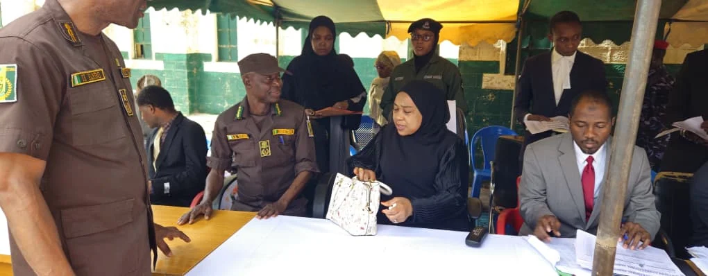 Source-origin Punch photo from the Kano jail delivery exercise, showing correctional and judicial officials at the venue.