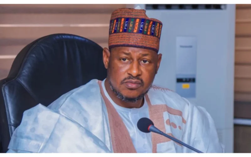 Katsina State Governor Dikko Radda seated at a meeting